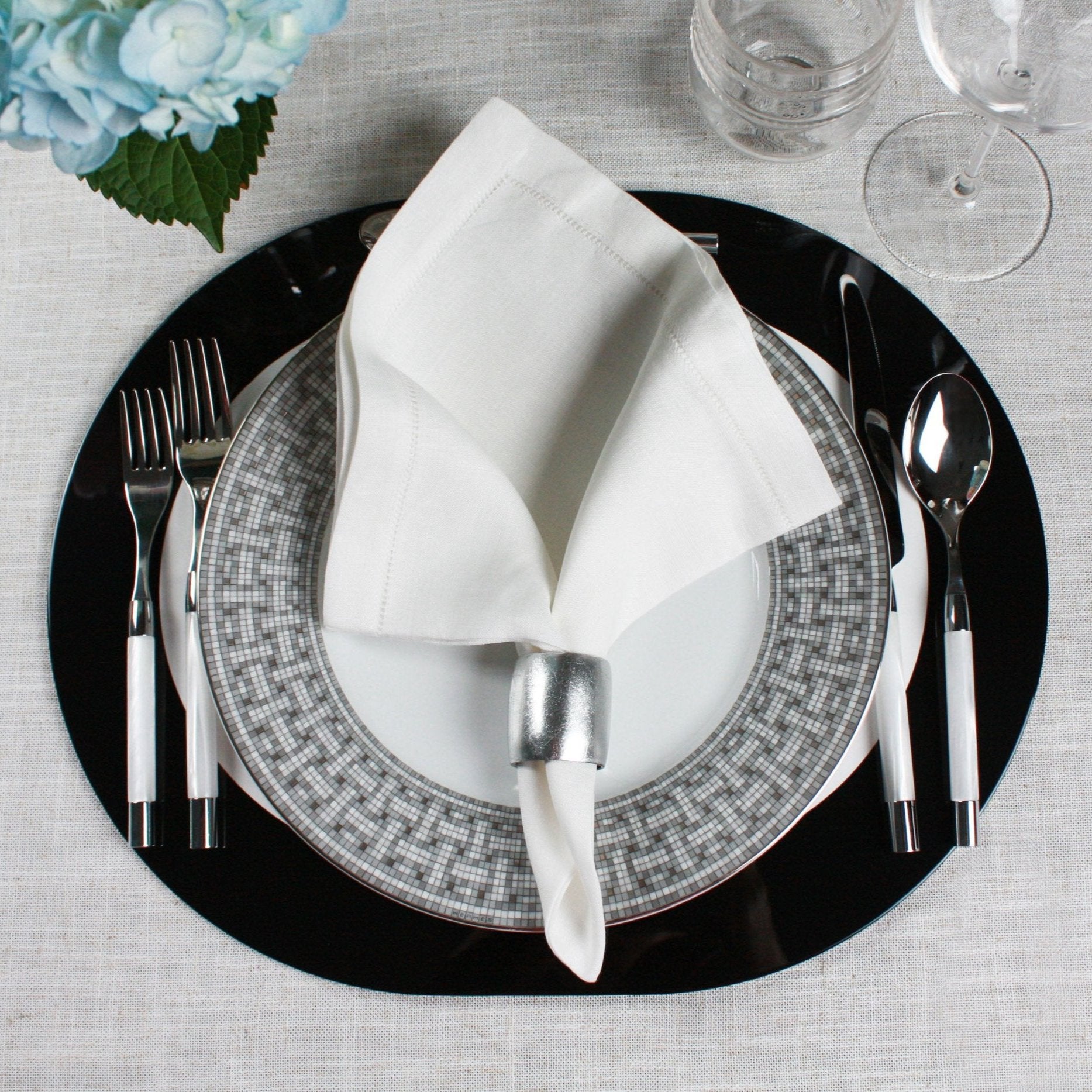 luxury black & white placemats with hermes, capdeco